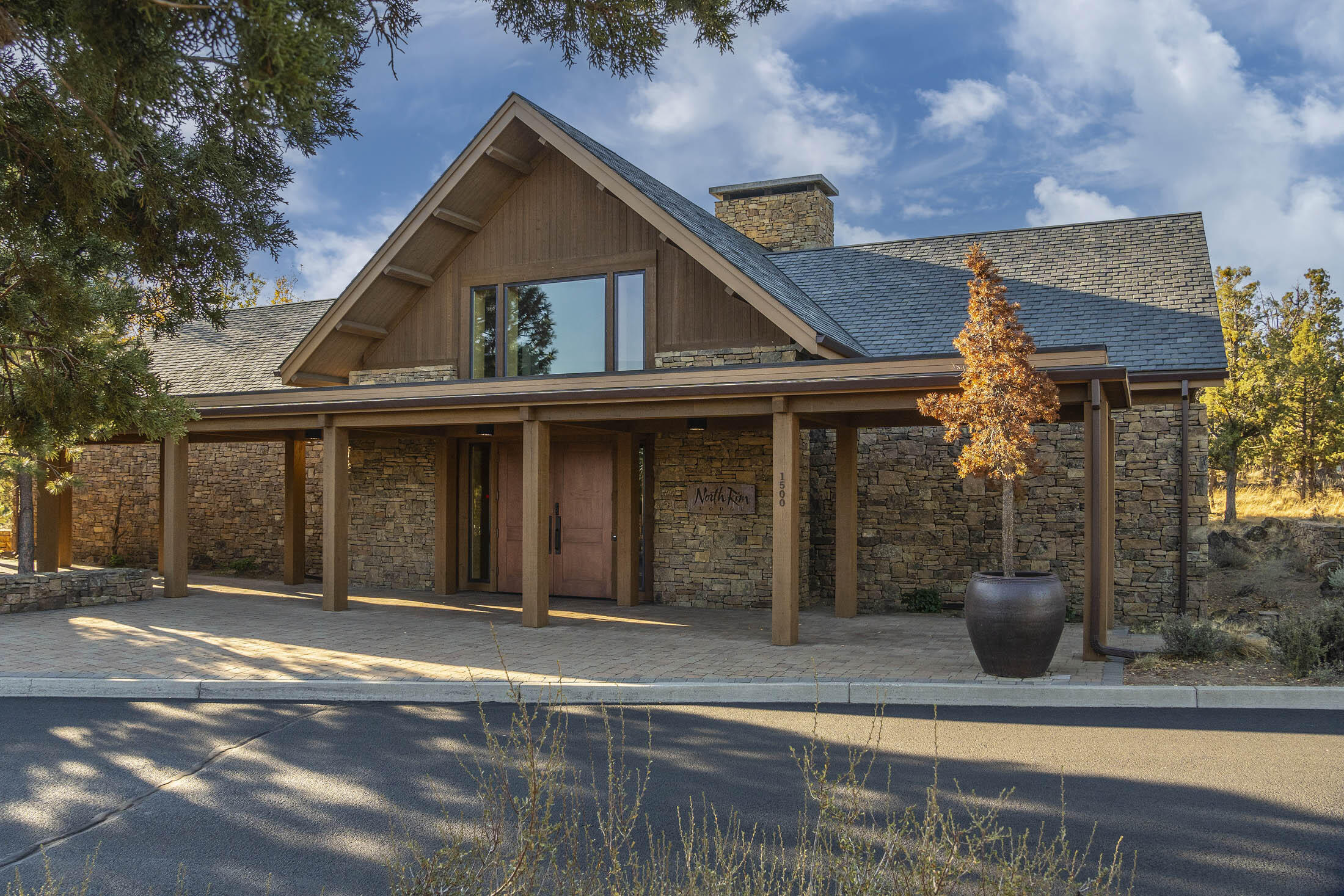 1584 Northwest Wild Rye Circle Bend, OR 97703 - Photo 22 of 30 The Lodge is an exclusive neighborhood amenity for North Rim owners and is host to private events, homeowner gatherings, and even a simple cup of coffee from time to time. The beauty and serenity of the Lodge provides a respite for owners and their guests alike. It truly is the heart of North Rim.