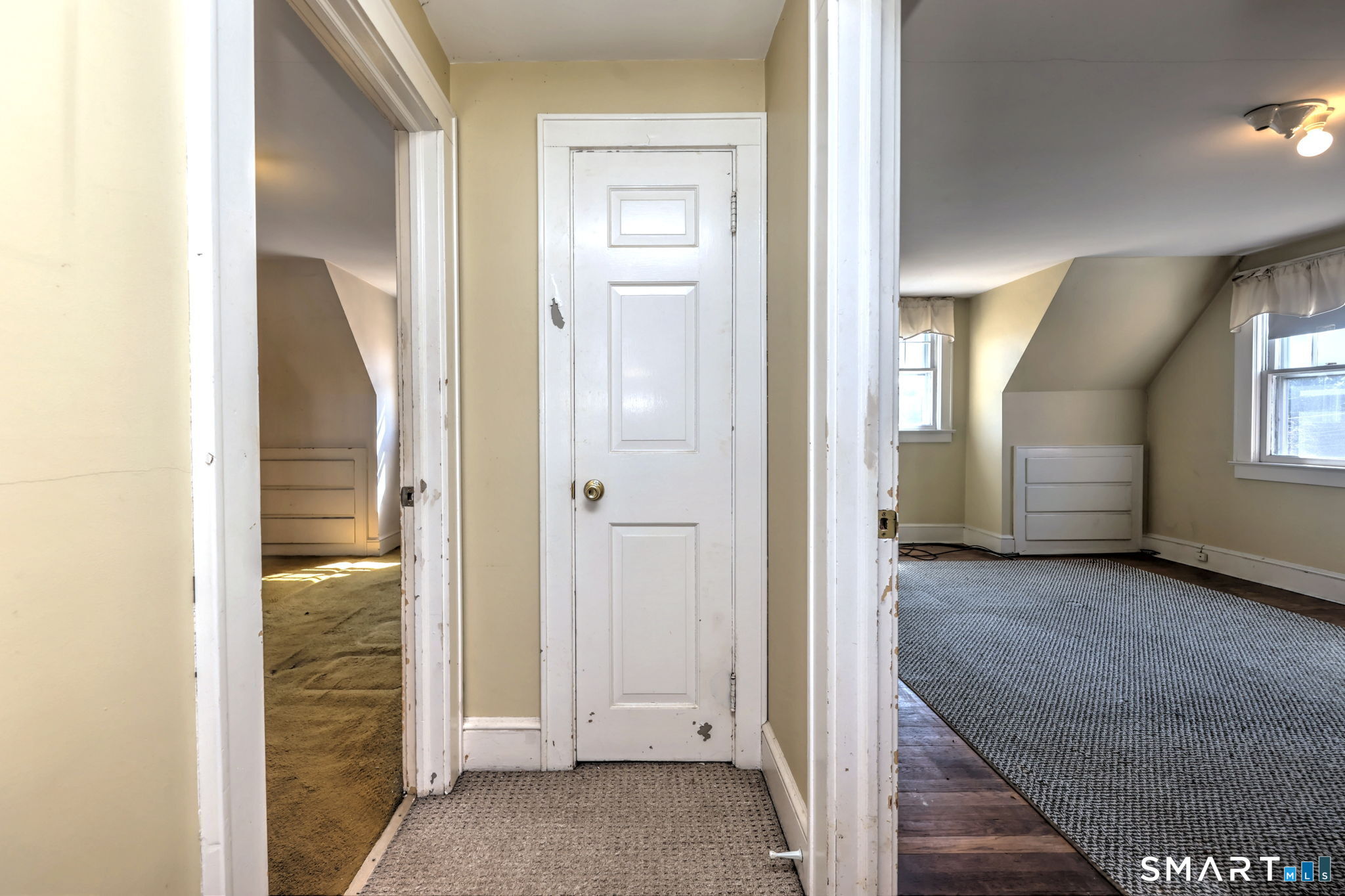 60 Myrtle Street Norwalk, CT 06855 - Photo 18 of 33 a view of a hallway with wooden floor and closet