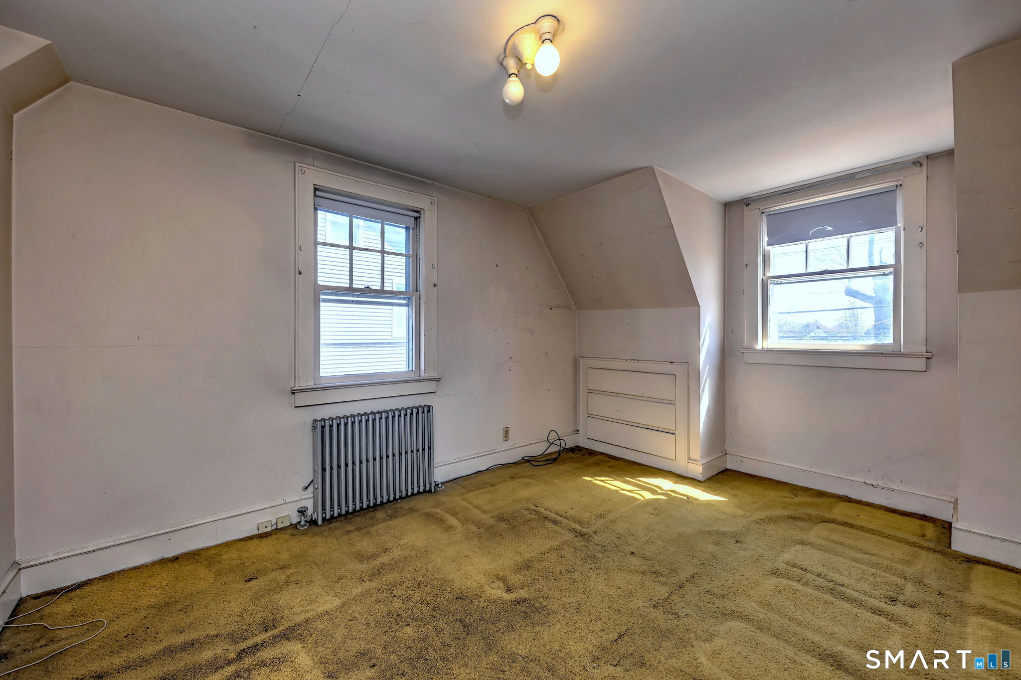 60 Myrtle Street Norwalk, CT 06855 - Photo 23 of 33 an empty room with windows