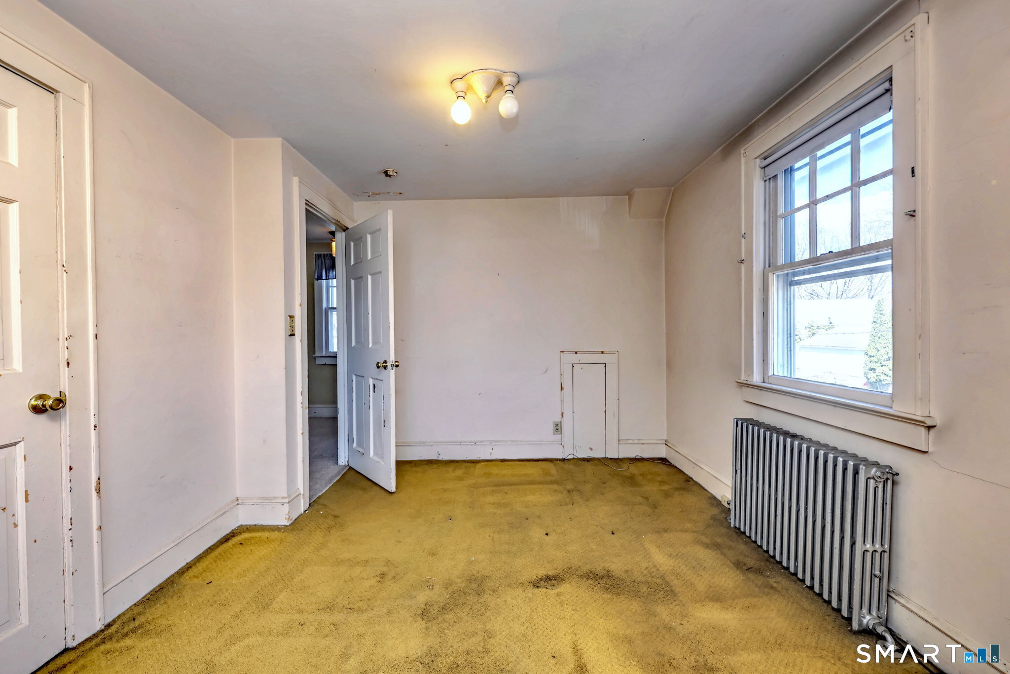 60 Myrtle Street Norwalk, CT 06855 - Photo 24 of 33 a view of an empty room with a window