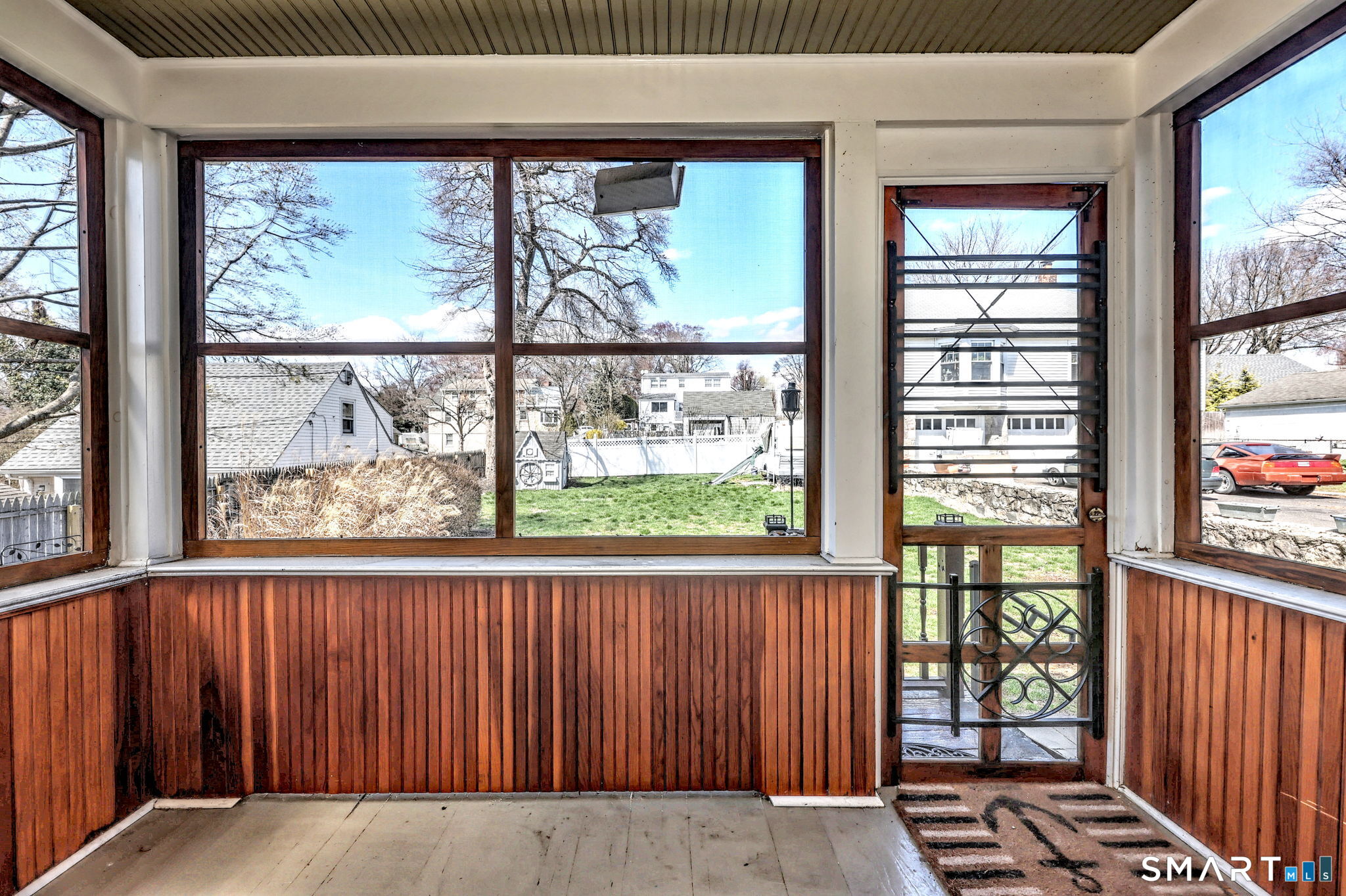 60 Myrtle Street Norwalk, CT 06855 - Photo 29 of 33 an empty room with wooden floor and a window