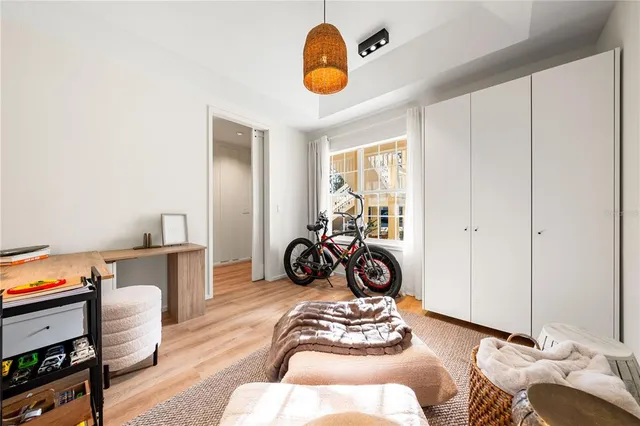 a front view of a house with parking space and parking