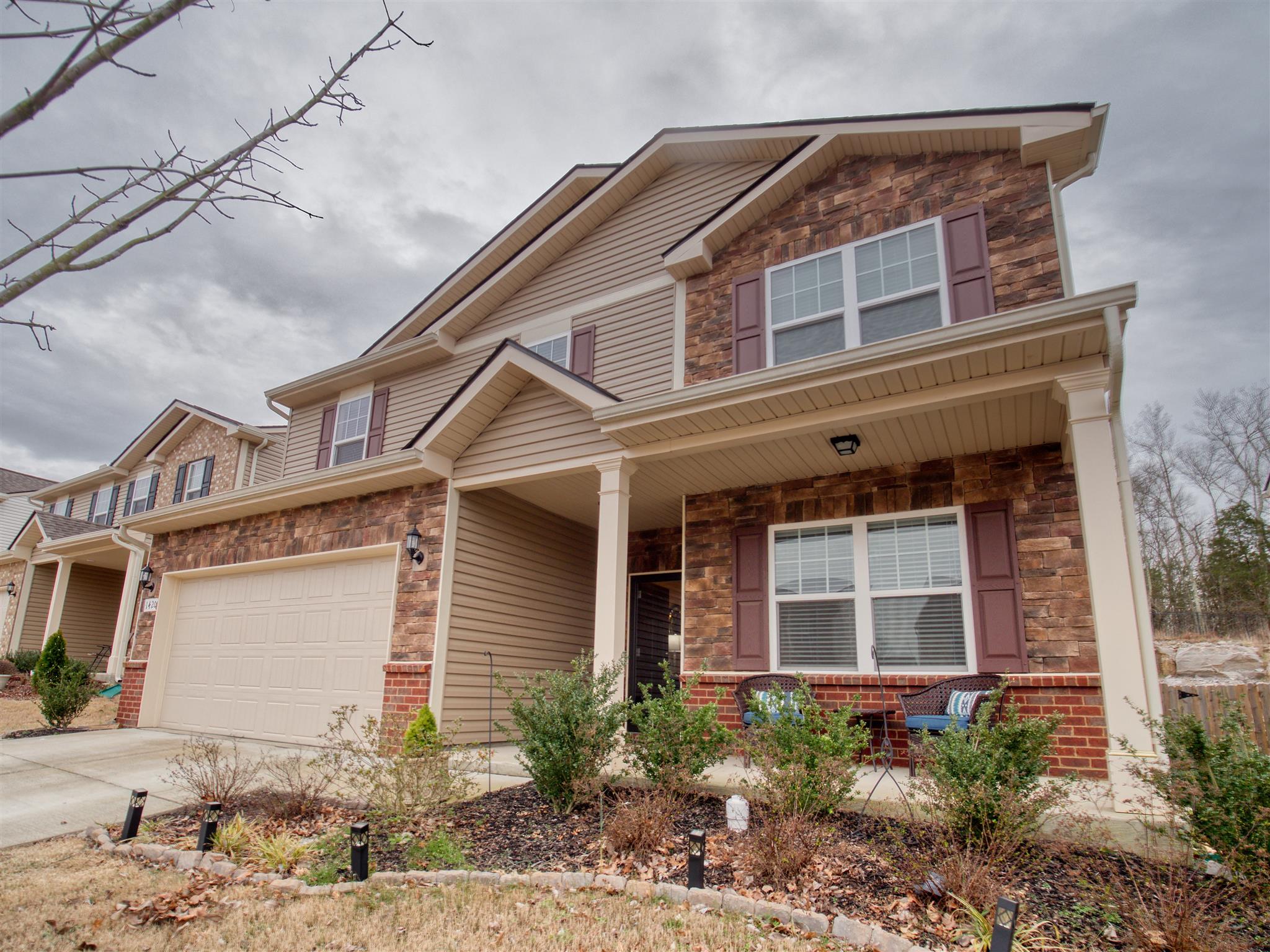 1420 Old Stone Road Lebanon, TN 37087 - Photo 2 of 23 a front view of a house with a yard