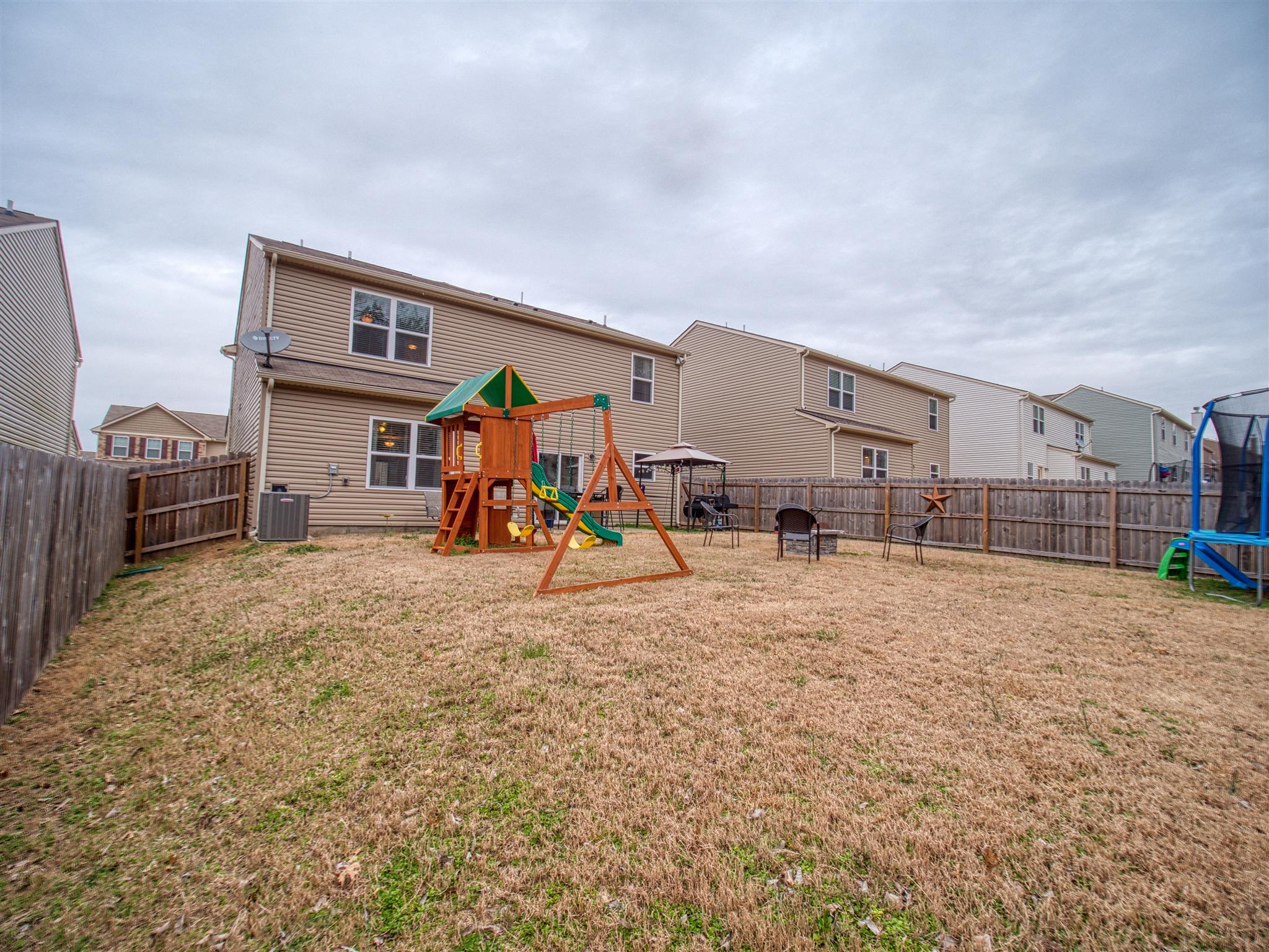 1420 Old Stone Road Lebanon, TN 37087 - Photo 22 of 23 a view of a house with a backyard