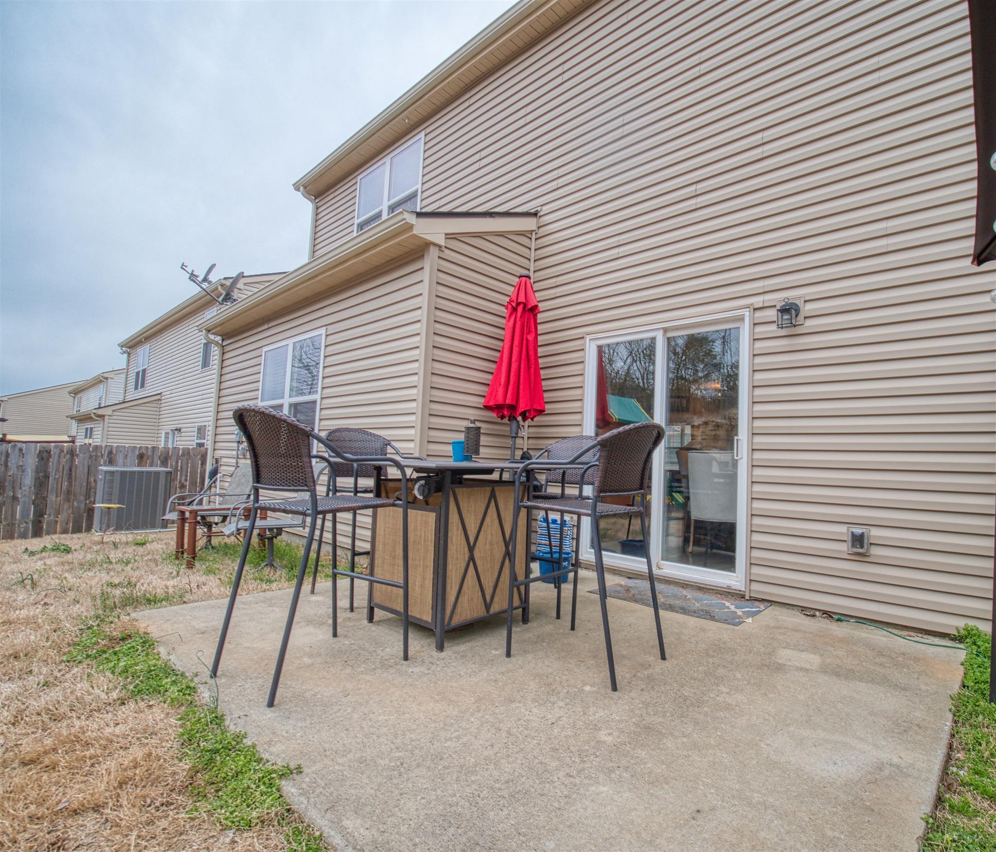 1420 Old Stone Road Lebanon, TN 37087 - Photo 23 of 23 a view of a house with a patio and a slide