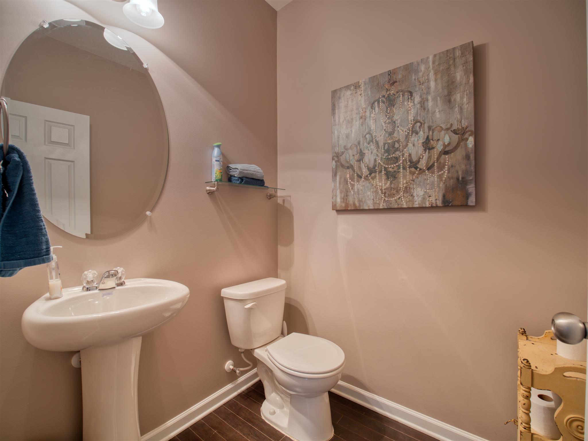1420 Old Stone Road Lebanon, TN 37087 - Photo 5 of 23 a bathroom with a toilet sink and mirror