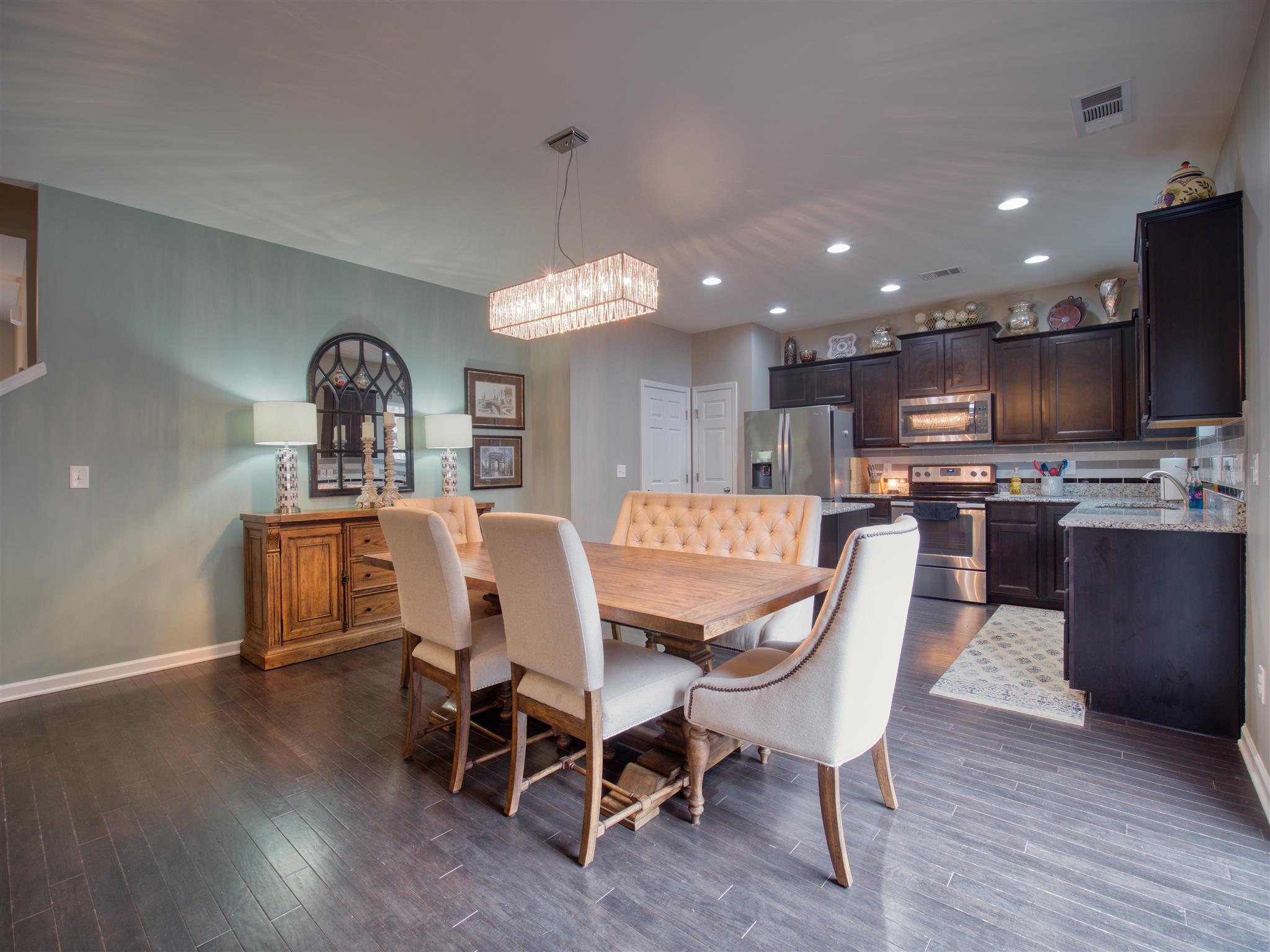 1420 Old Stone Road Lebanon, TN 37087 - Photo 8 of 23 a view of a dining room with furniture and wooden floor
