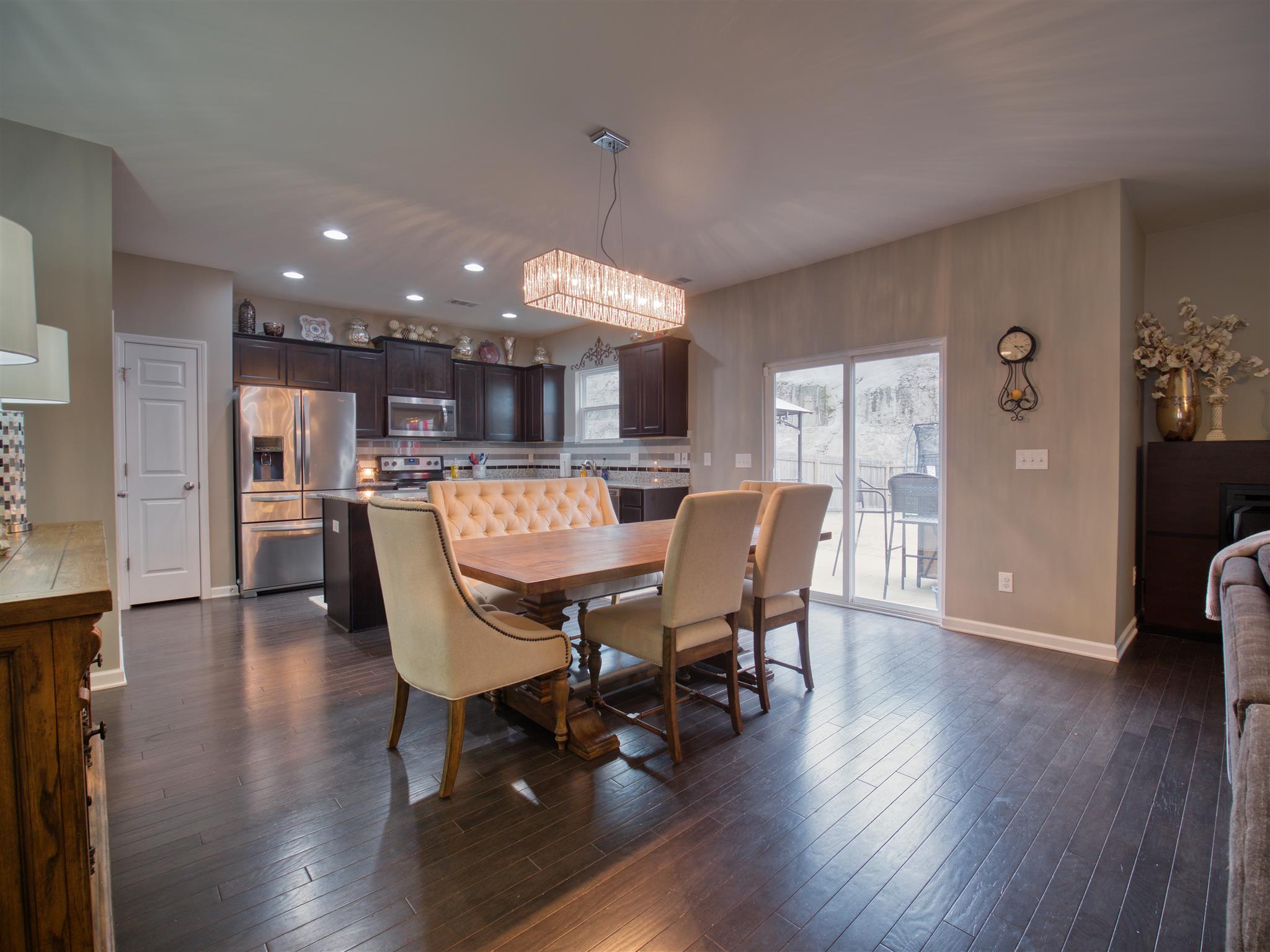 1420 Old Stone Road Lebanon, TN 37087 - Photo 9 of 23 a view of a dining room with furniture and wooden floor