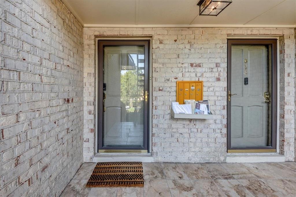 37 La Rue Place Northwest Atlanta, GA 30327 - Photo 24 of 35 a view of a entryway door of the house