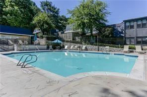 37 La Rue Place Northwest Atlanta, GA 30327 - Photo 29 of 35 a house view with a sitting space fire pit and outdoor space