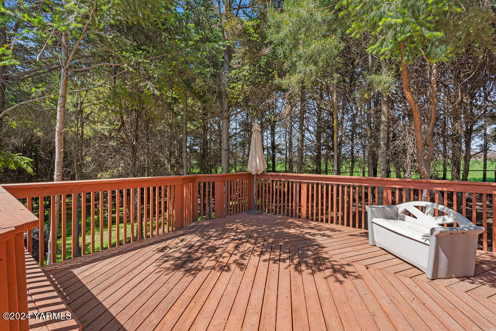 1241 Nelson Road Granger, WA 98932 - Photo 37 of 45 a view of a wooden deck with a patio
