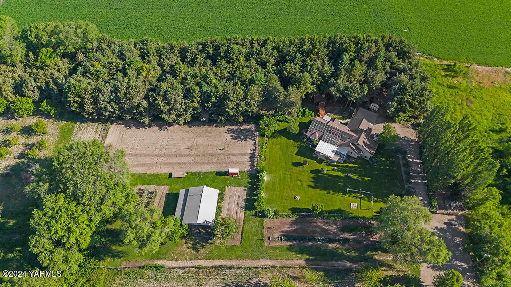 1241 Nelson Road Granger, WA 98932 - Photo 41 of 45 an aerial view of a house with a yard