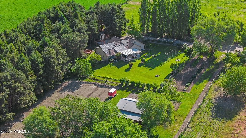 1241 Nelson Road Granger, WA 98932 - Photo 42 of 45 an aerial view of a house with a garden