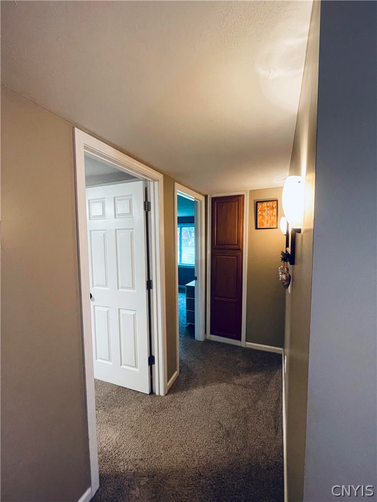 4982 Aitchison Road Onondaga, NY 13215 - Photo 11 of 26 Linen closet at the end of the hall