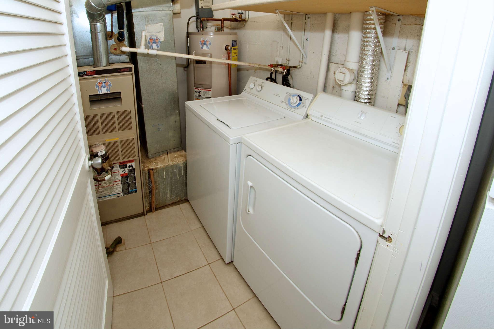 2211 Southgate Square Reston, VA 20191 - Photo 14 of 26 a utility room with dryer and washer