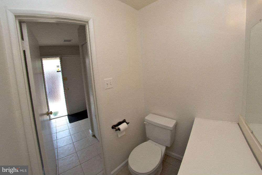 2211 Southgate Square Reston, VA 20191 - Photo 15 of 26 a white toilet sitting next to a sink