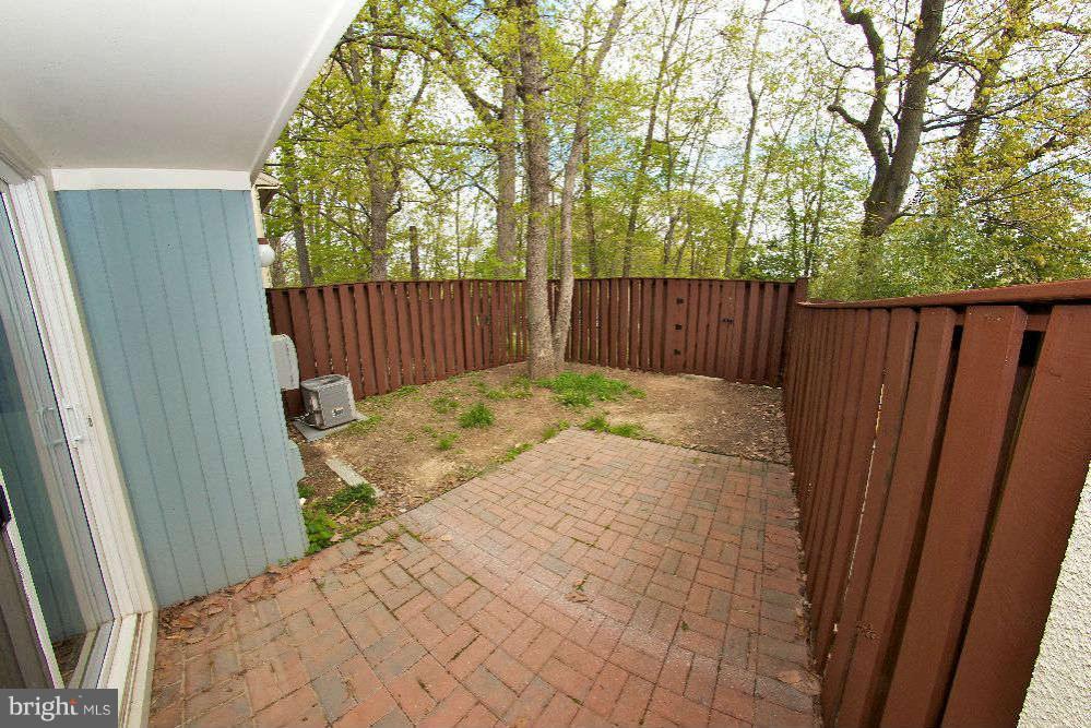2211 Southgate Square Reston, VA 20191 - Photo 24 of 26 a view of balcony with wooden fence