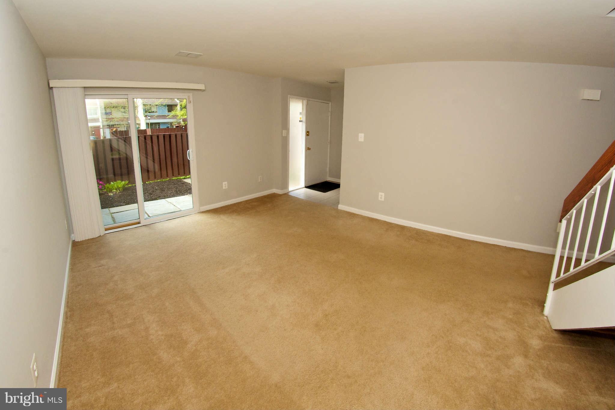 2211 Southgate Square Reston, VA 20191 - Photo 4 of 26 an empty room with windows