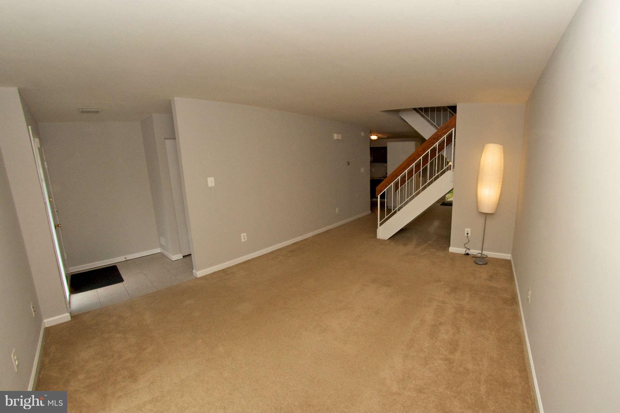 2211 Southgate Square Reston, VA 20191 - Photo 5 of 26 a view of an empty room with stairs
