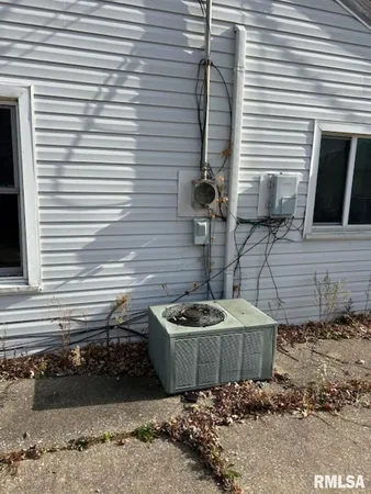 a bathroom with a sink and a window