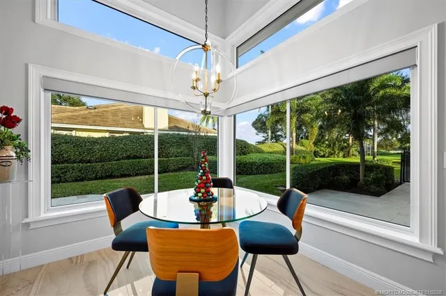 a bathroom with a sink mirror and toilet