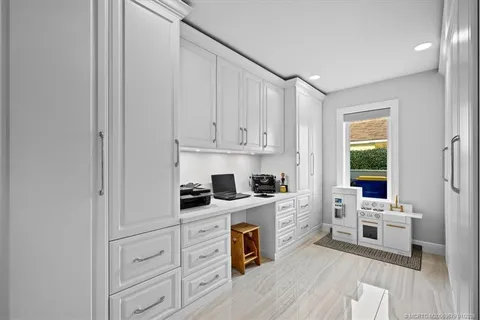 a bed room with a bed and a chair