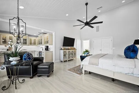 a view of a patio with swimming pool