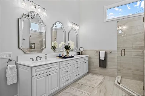 a view of a patio with a table and chairs under an umbrella