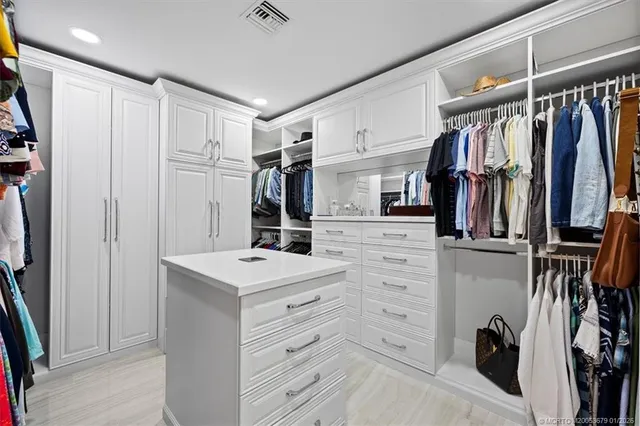 a front view of a house with swimming pool yard and patio