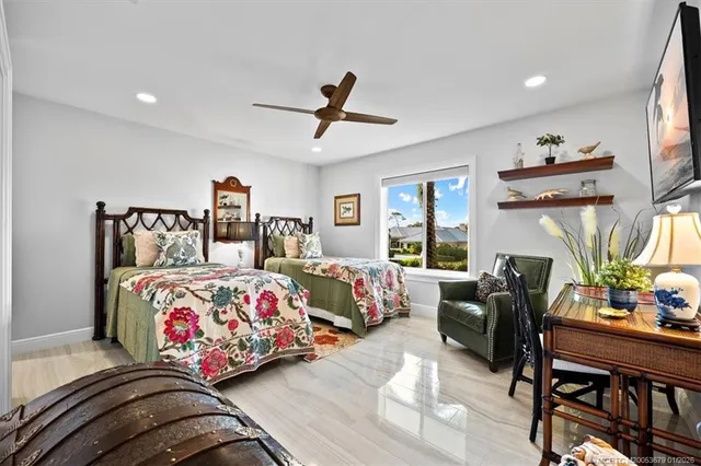a living room with furniture a window and a fireplace