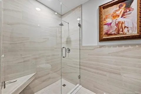 a view of a patio with a table and chairs under an umbrella with a patio