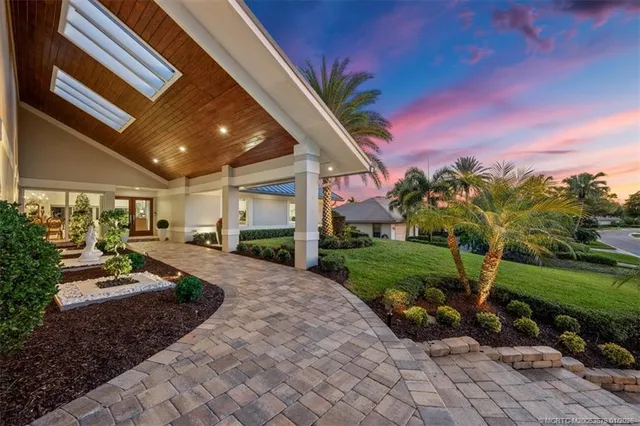 a view of a house with a big yard