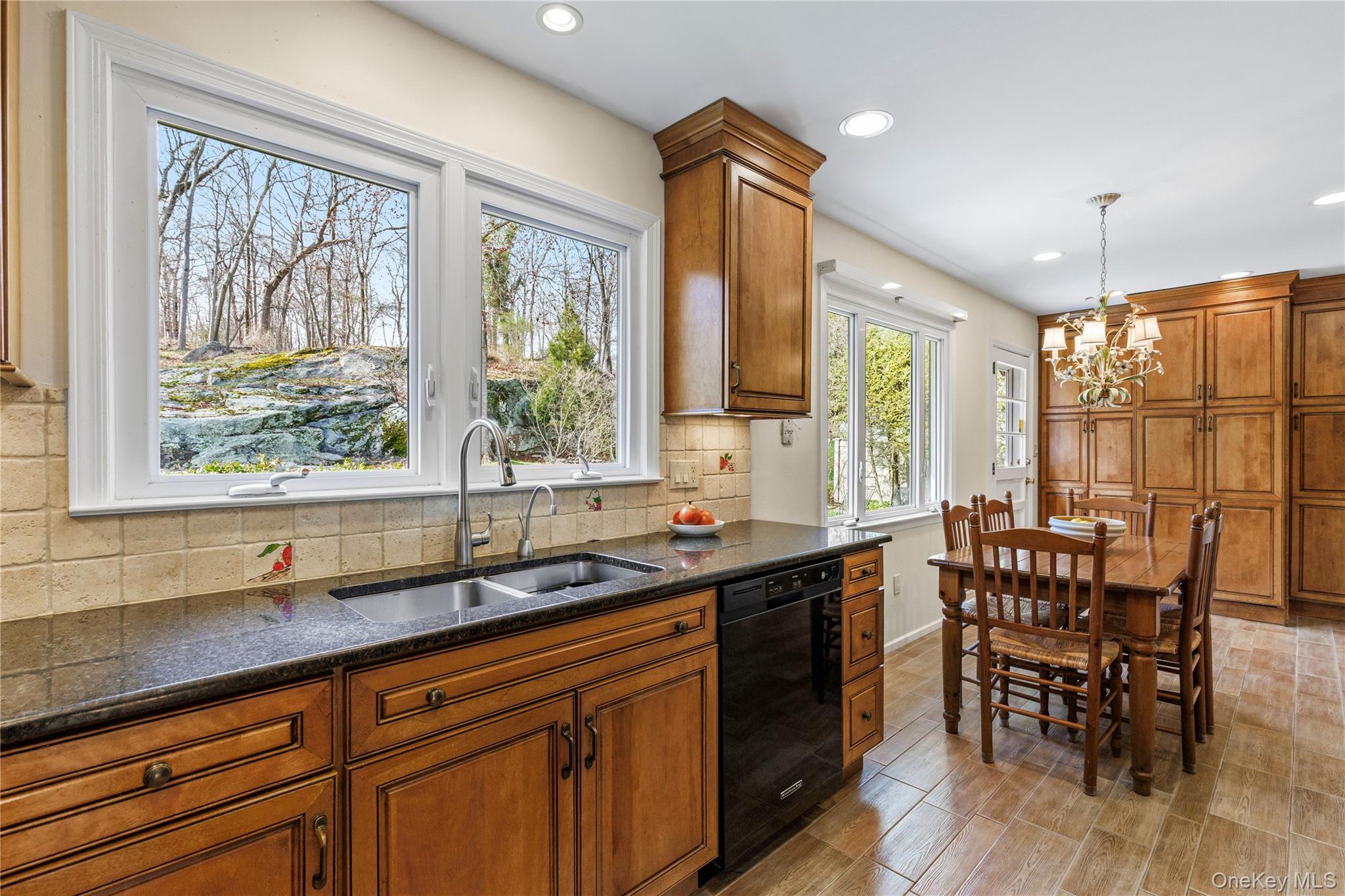 14 Loewen Court Rye, NY 10580 - Photo 6 of 25 The kitchen offers access to yard and patio