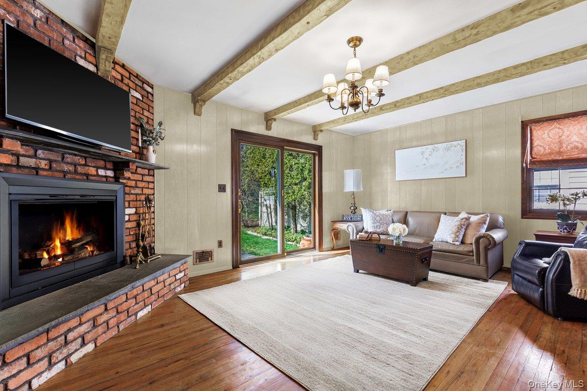 14 Loewen Court Rye, NY 10580 - Photo 8 of 25 Imagine the possibilities in this virtually staged family room photo!