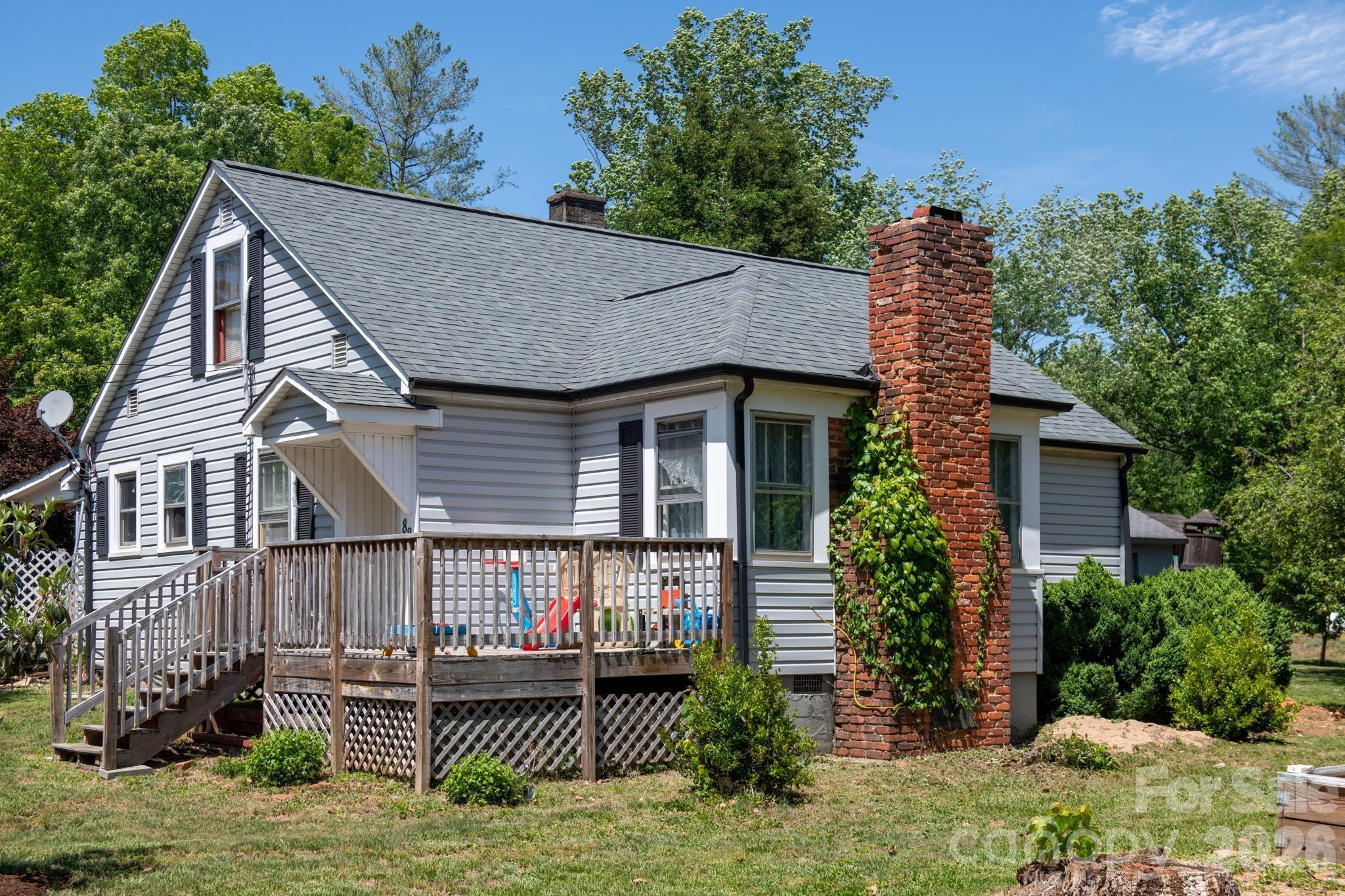 828 Jamestown Road Morganton, NC 28655 - Photo 1 of 36 a view of house with outdoor space and sitting area