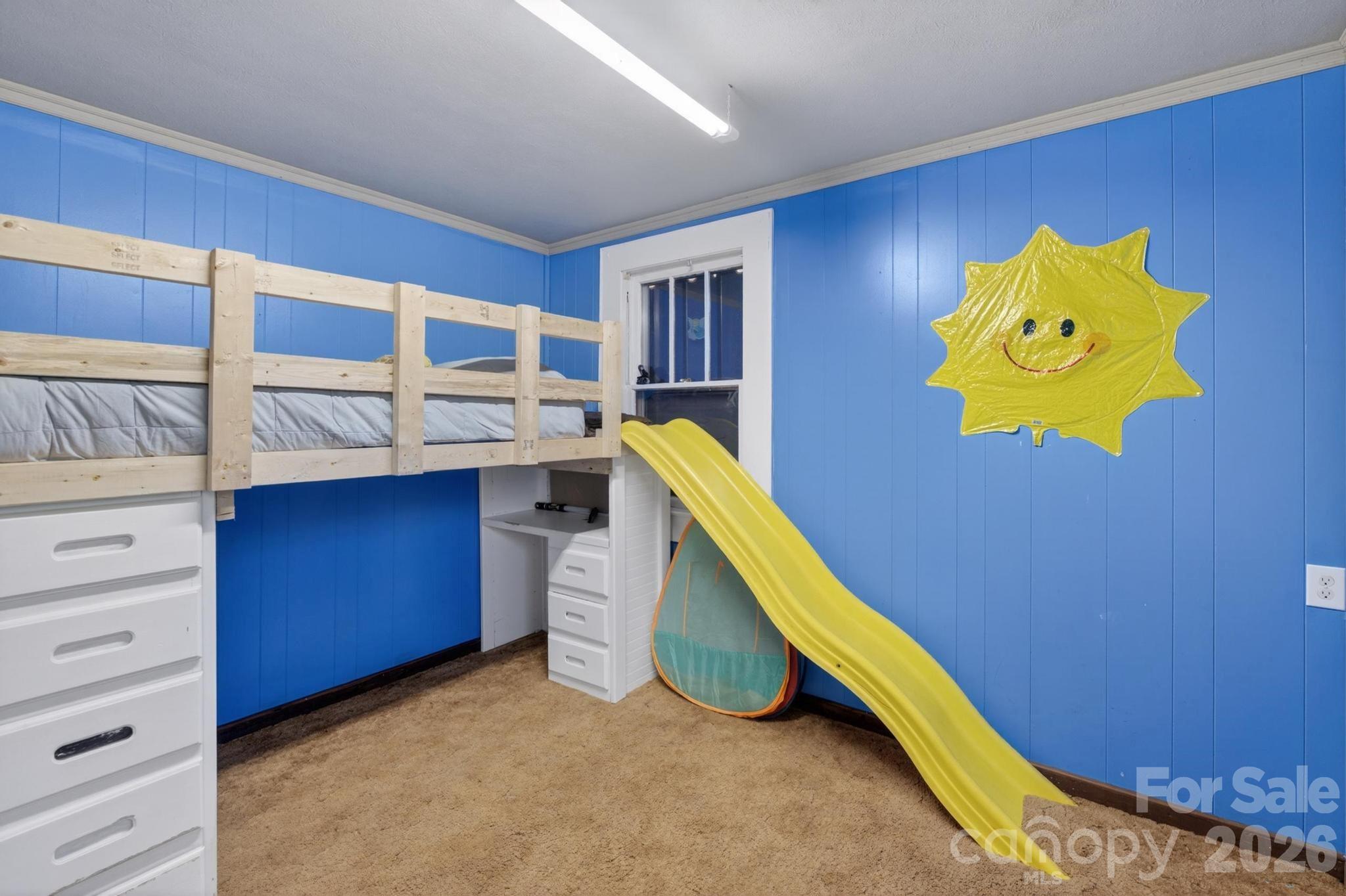 828 Jamestown Road Morganton, NC 28655 - Photo 16 of 36 a bed room with a bed and a stairs