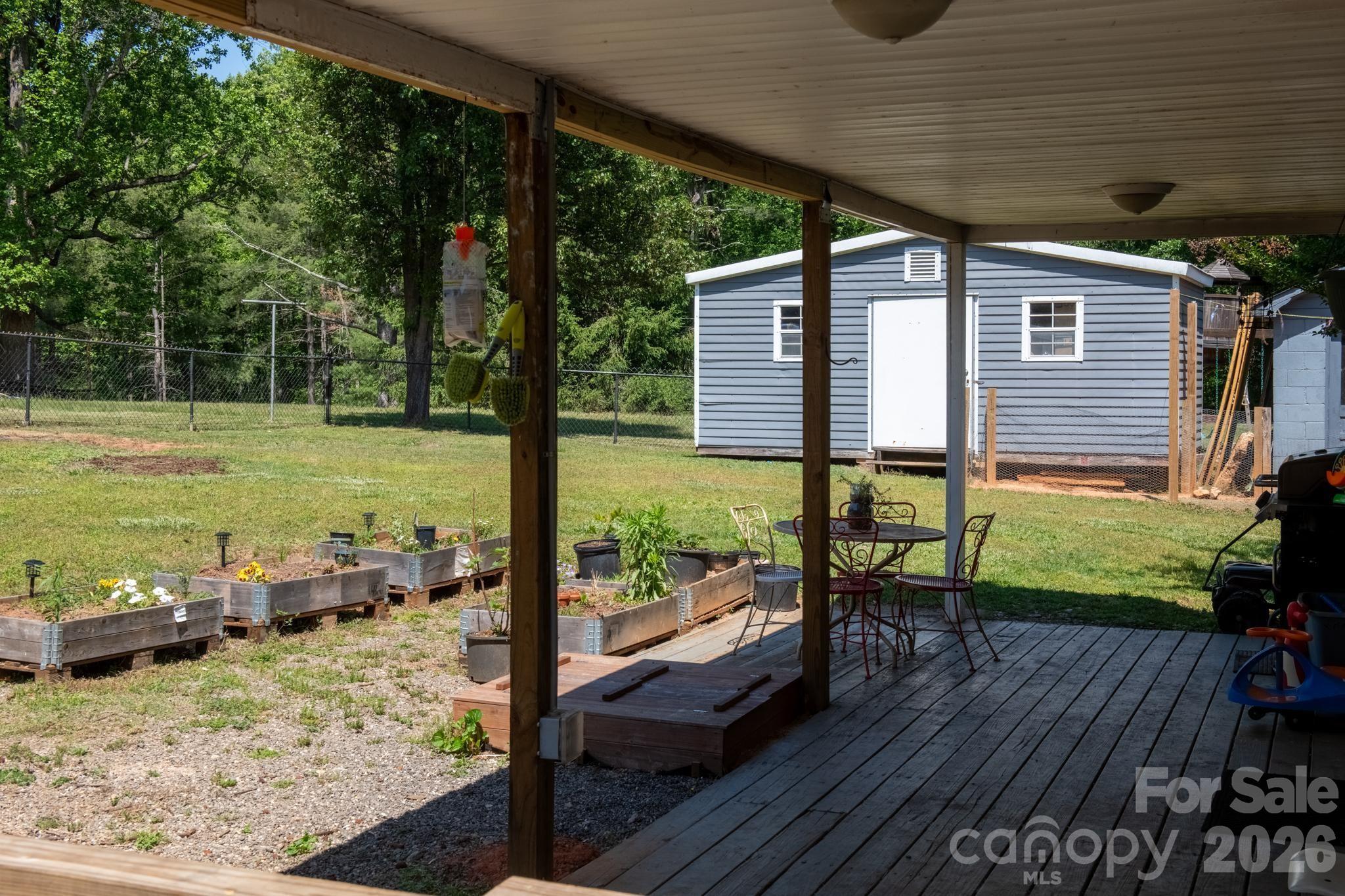 828 Jamestown Road Morganton, NC 28655 - Photo 2 of 36 a view of a two chair in the patio