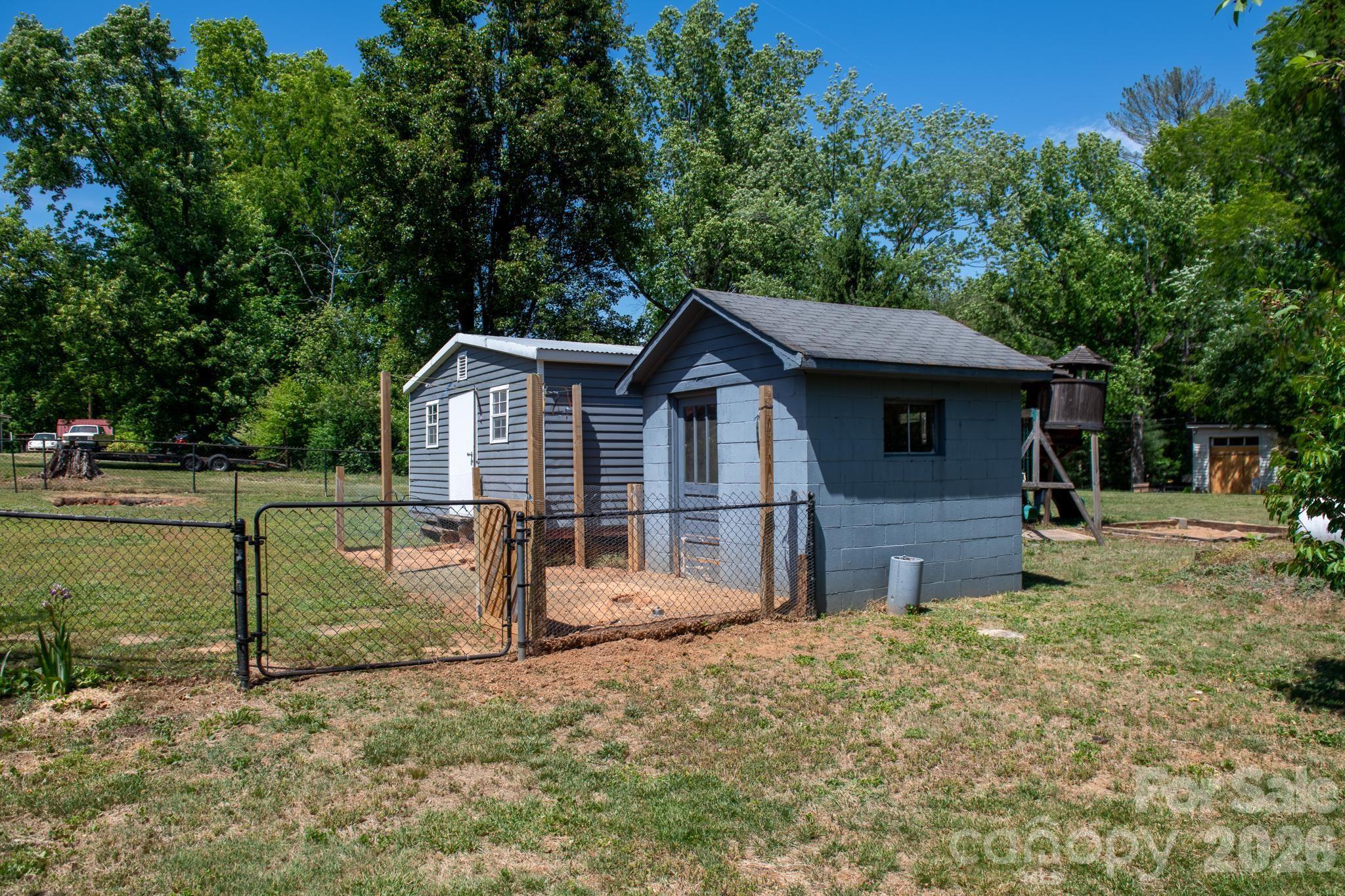 828 Jamestown Road Morganton, NC 28655 - Photo 23 of 36 a view of a house with backyard