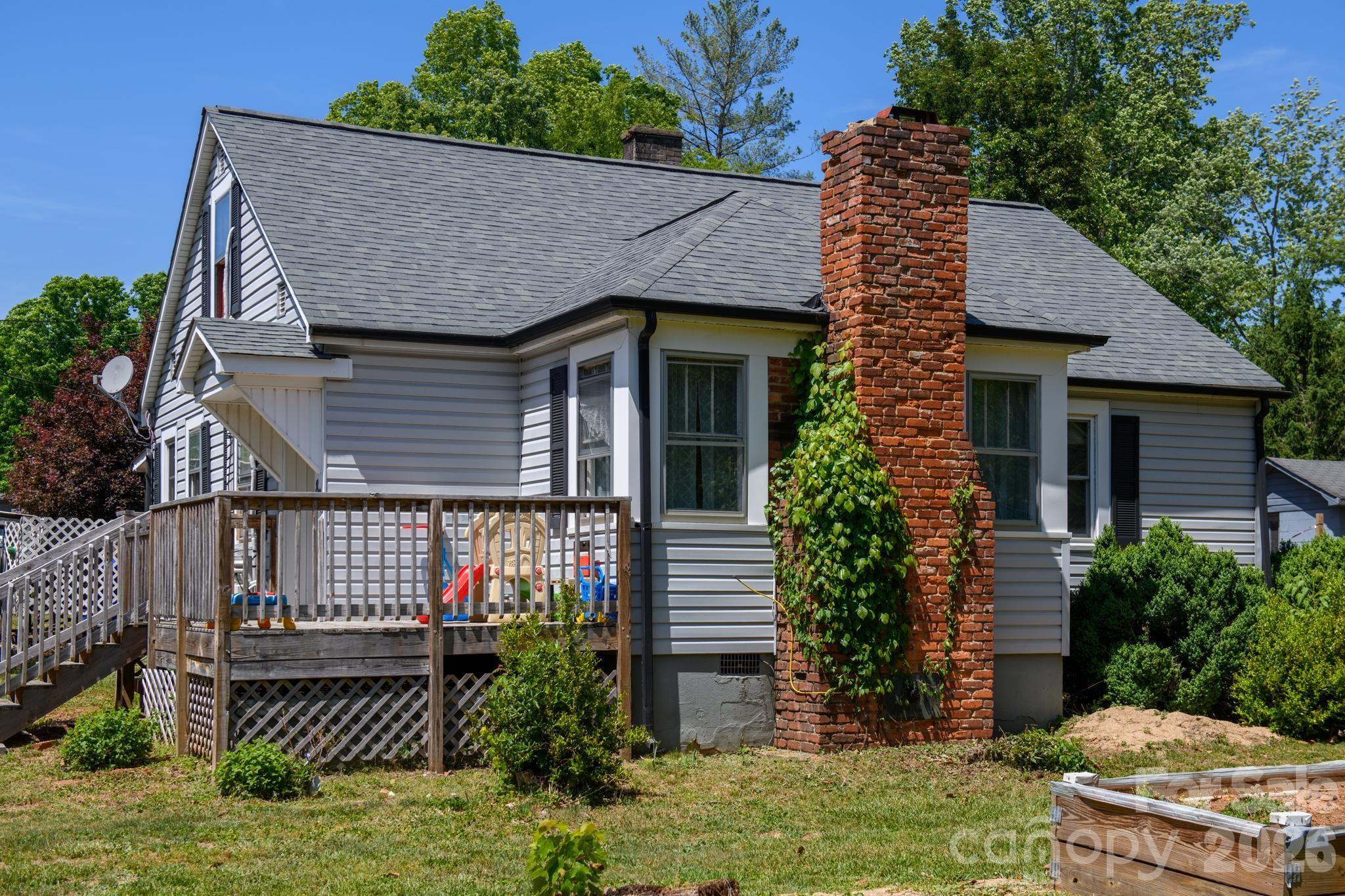 828 Jamestown Road Morganton, NC 28655 - Photo 35 of 36 a front view of a house with garden