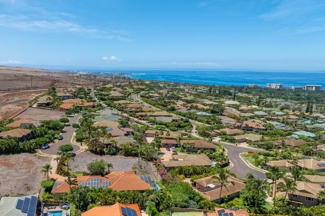 an aerial view of residential building and green space