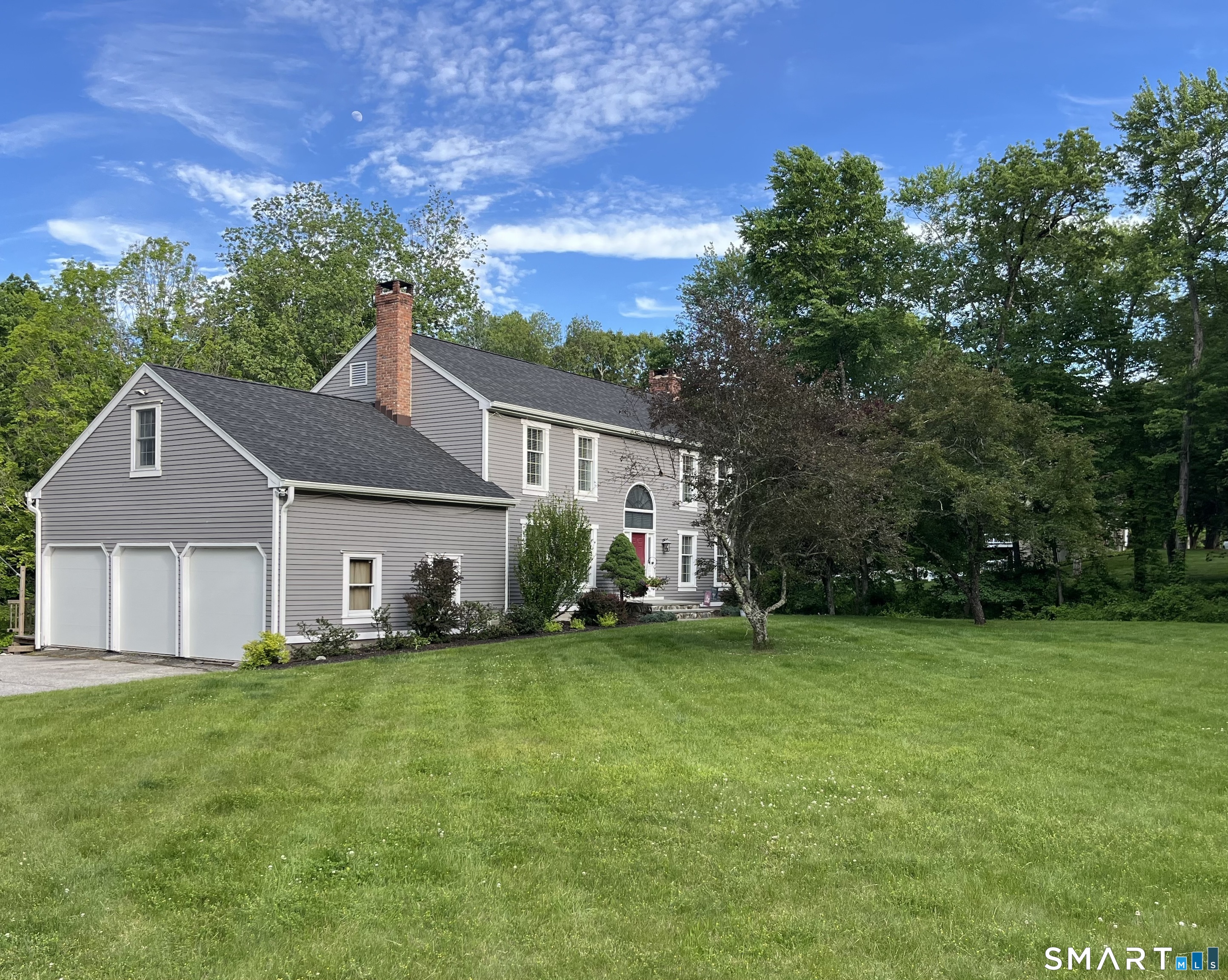 47 Merwin Brook Road Brookfield, CT 06804 - Photo 2 of 29 front view of a house with a yard