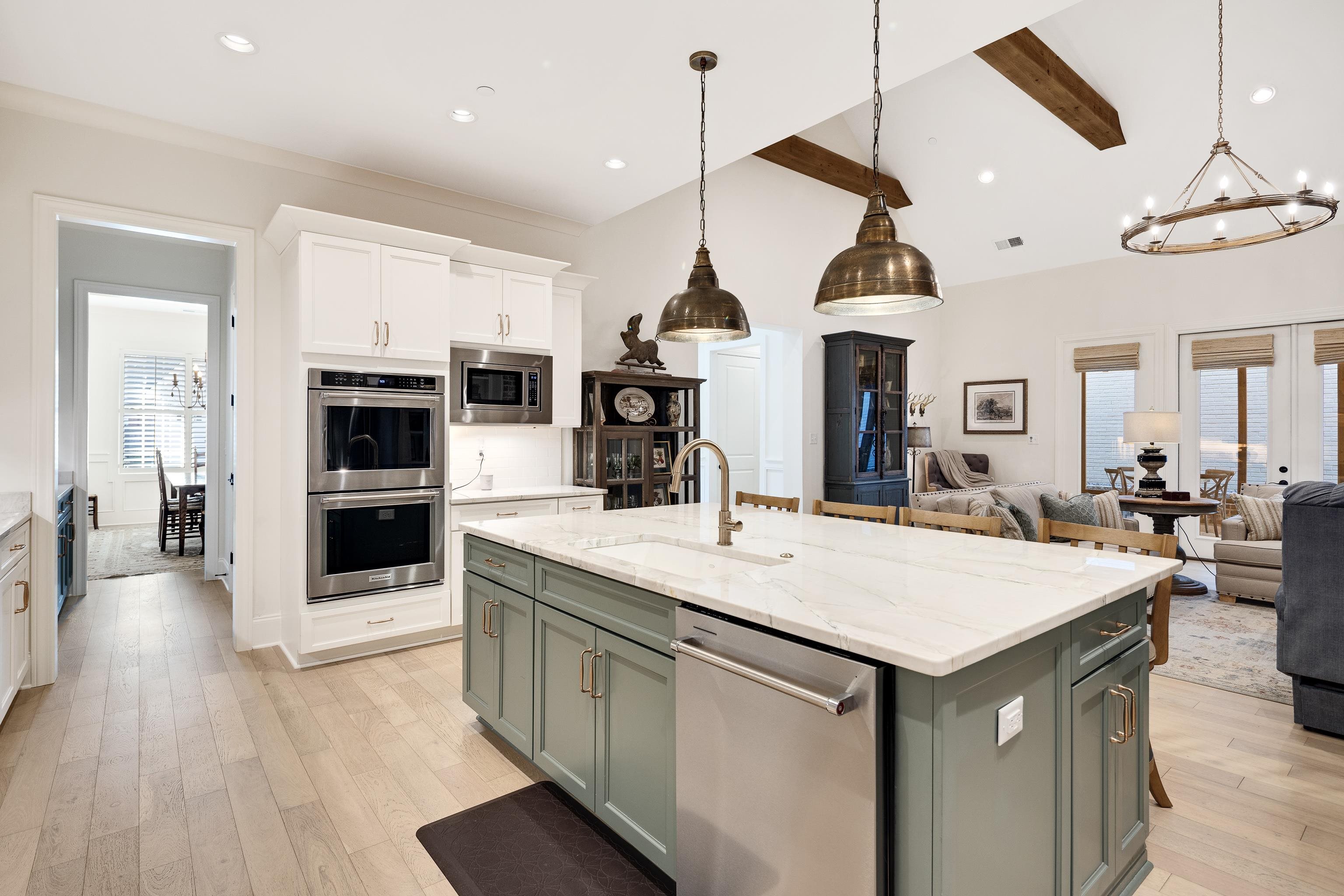 10138 Cliveden Circle South Collierville, TN 38017 - Photo 12 of 39 a kitchen with a sink a counter top space stainless steel appliances and cabinets
