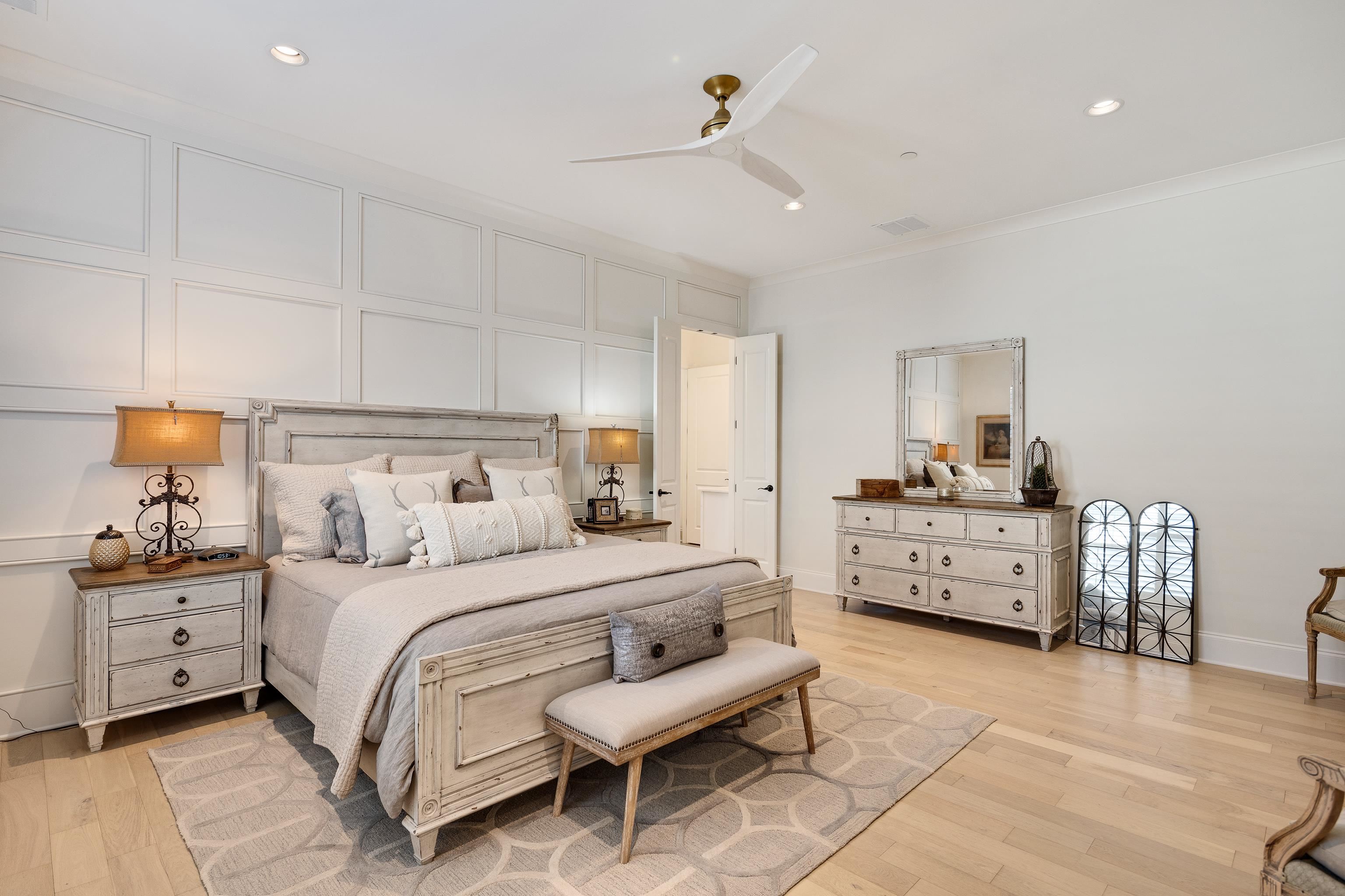 10138 Cliveden Circle South Collierville, TN 38017 - Photo 19 of 39 a bedroom with a bed and a dresser
