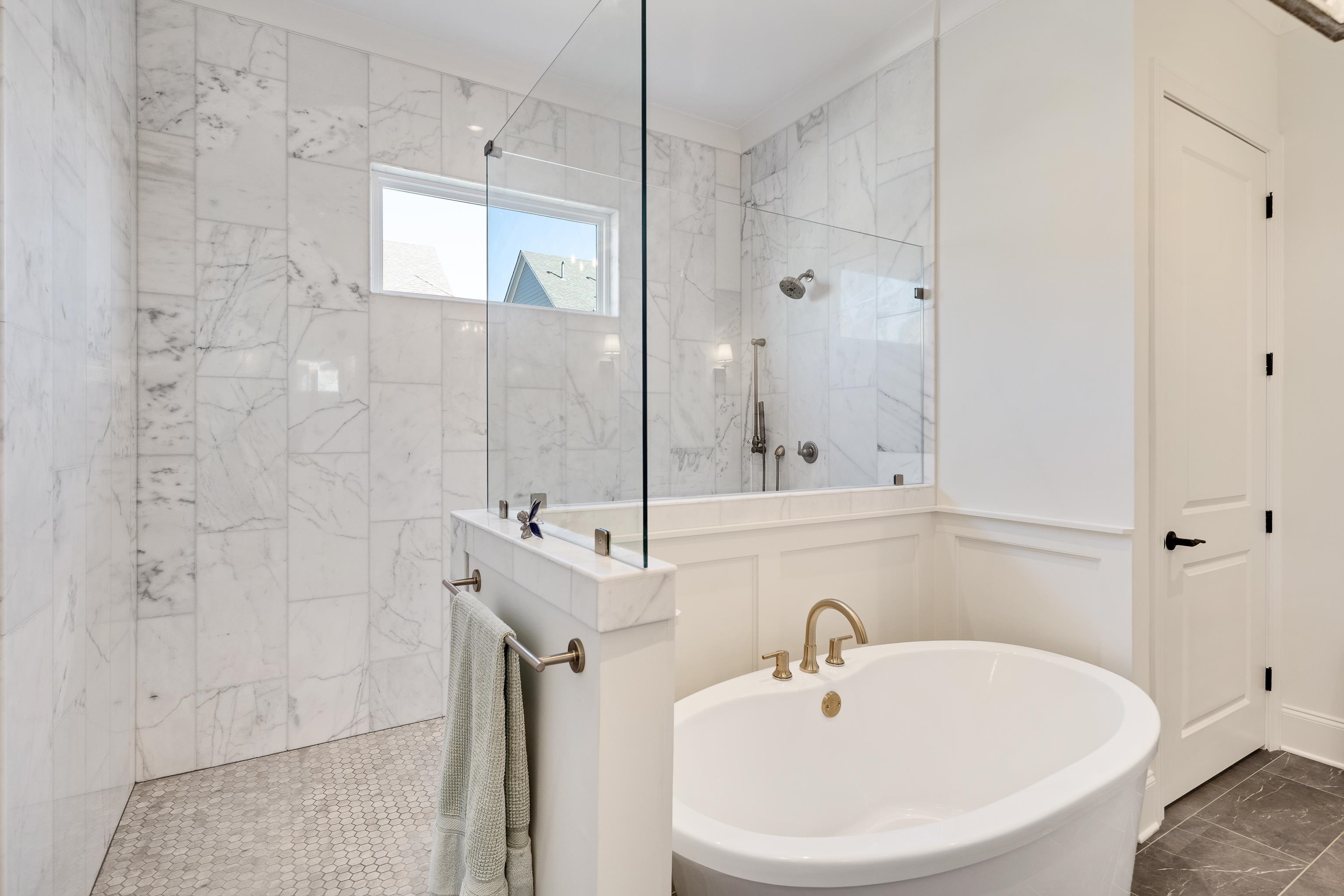 10138 Cliveden Circle South Collierville, TN 38017 - Photo 22 of 39 a bathroom with a sink a mirror and shower
