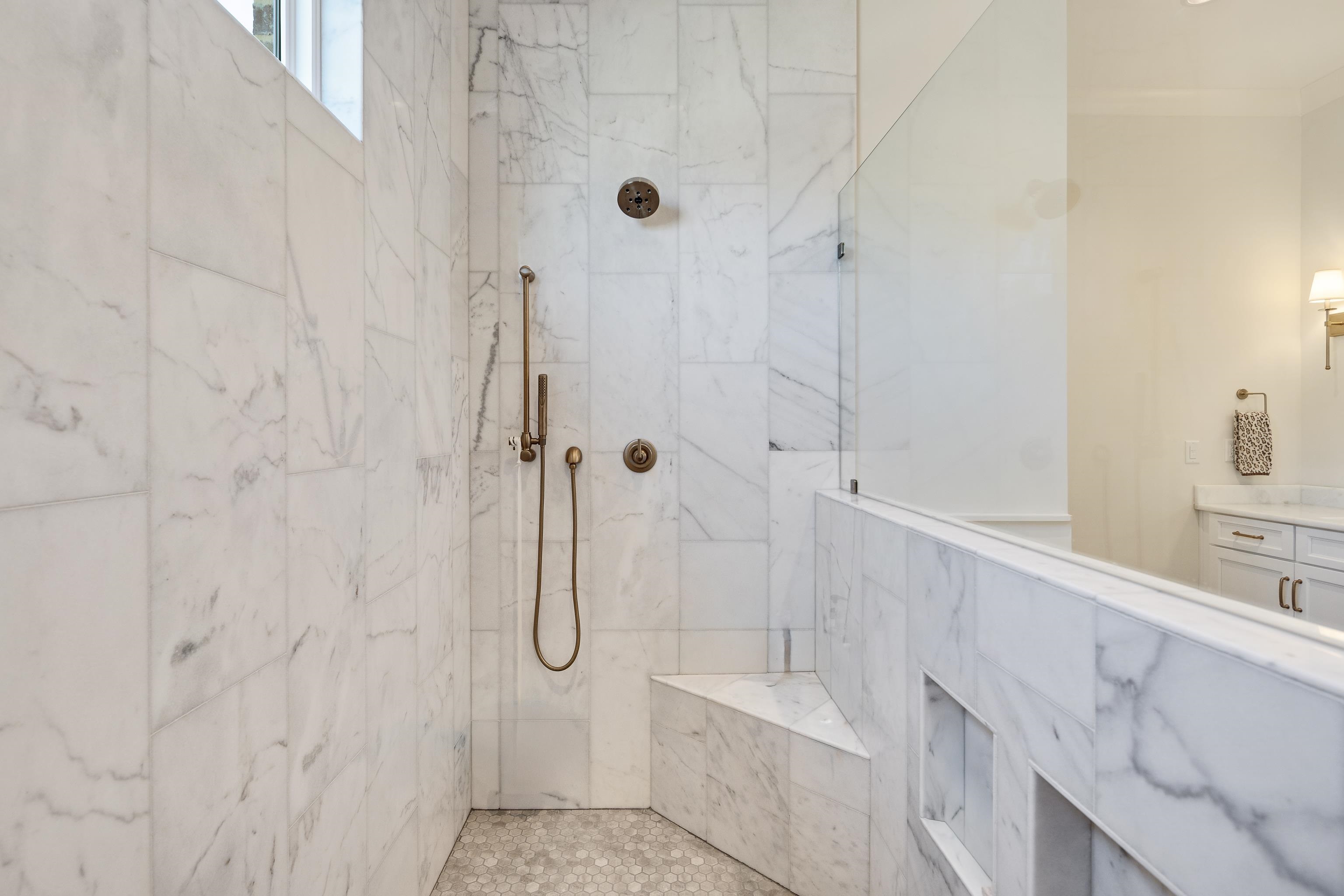 10138 Cliveden Circle South Collierville, TN 38017 - Photo 23 of 39 a bathroom with a bathtub and shower