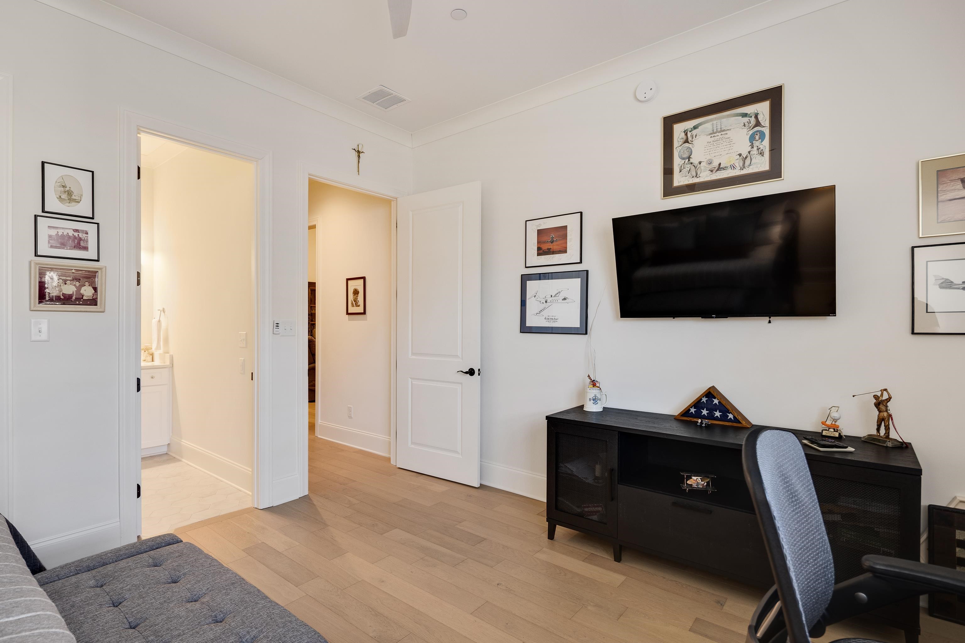 10138 Cliveden Circle South Collierville, TN 38017 - Photo 27 of 39 a view of a workspace with a flat screen tv