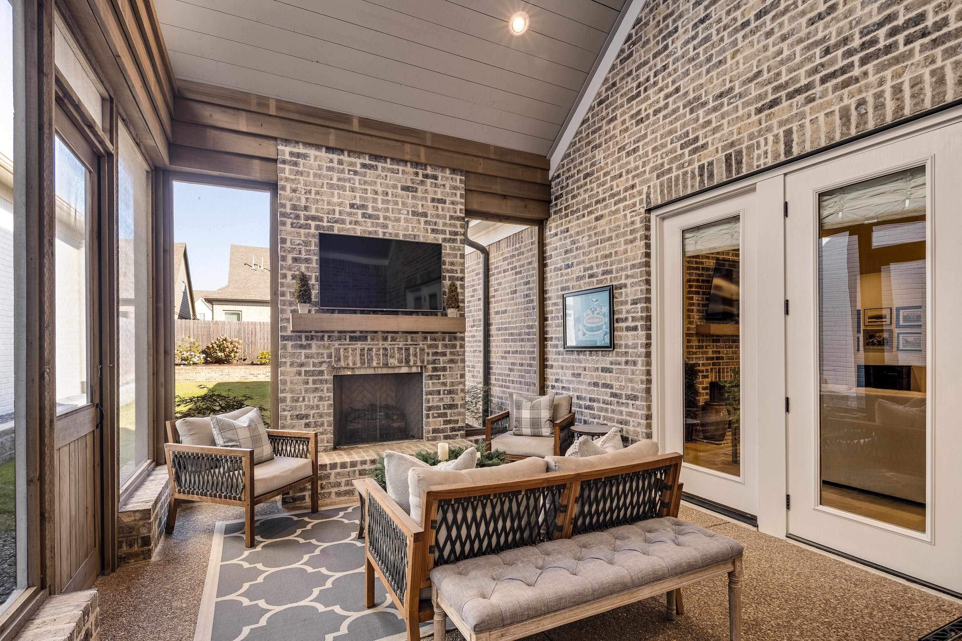 10138 Cliveden Circle South Collierville, TN 38017 - Photo 36 of 39 a balcony with furniture and a fireplace