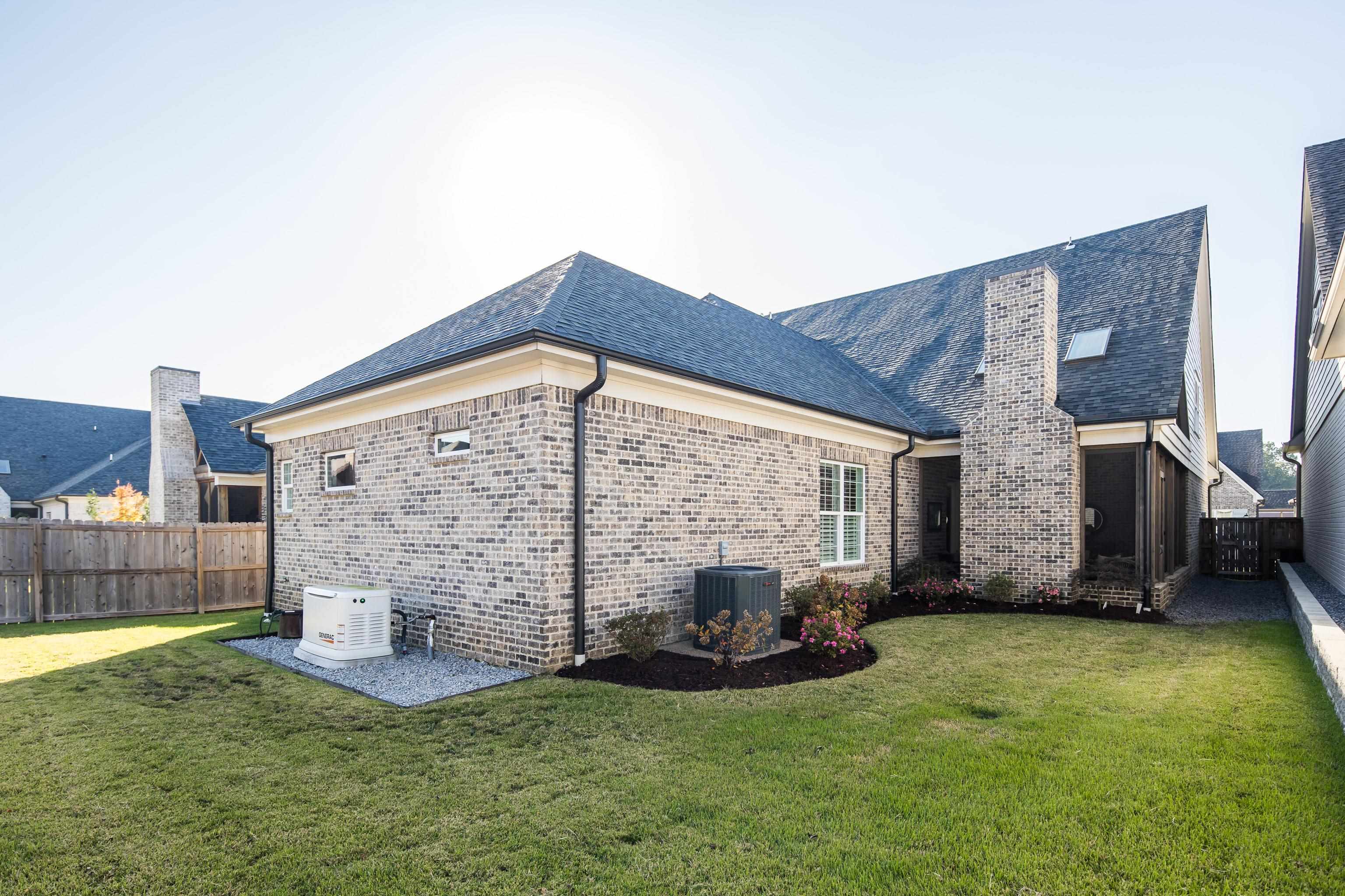 10138 Cliveden Circle South Collierville, TN 38017 - Photo 38 of 39 a view of a house with backyard and porch