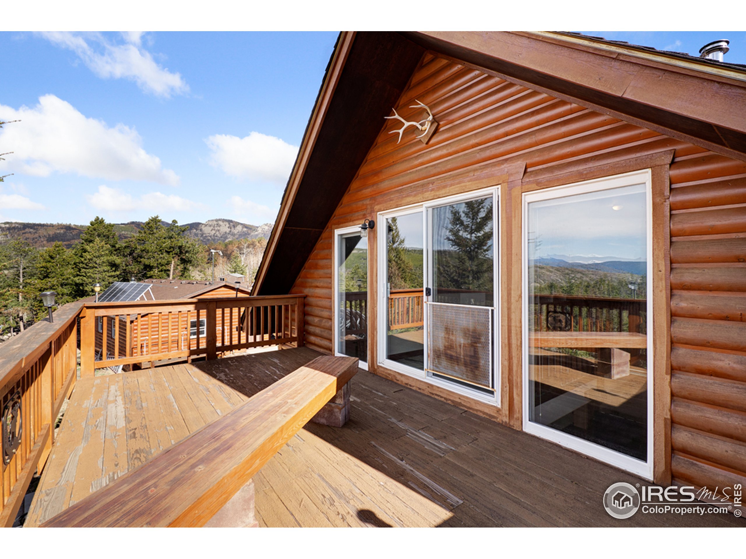 1075 Meadows Drive Drake, CO 80515 - Photo 21 of 30 a view of balcony with couch