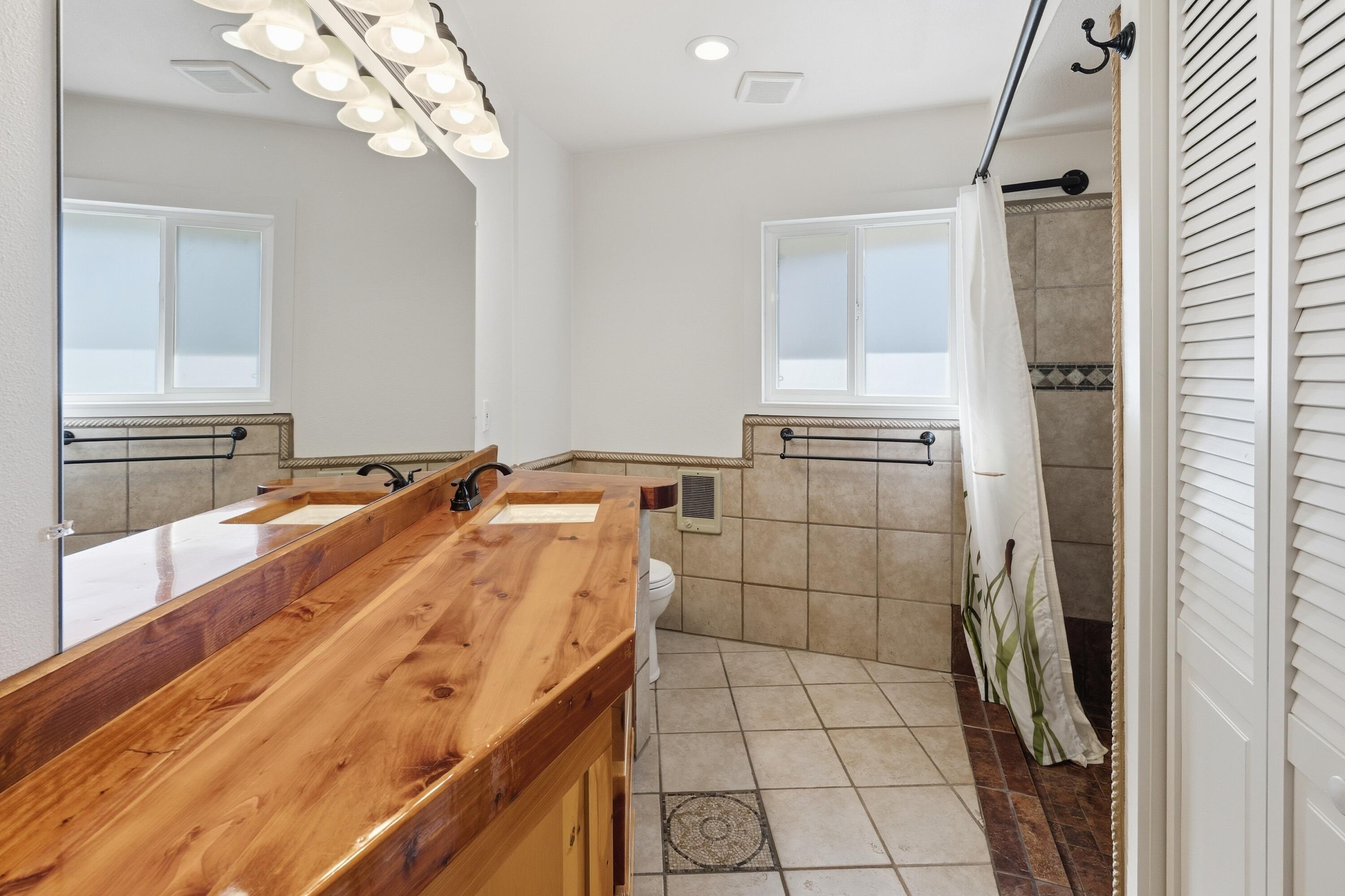 4074 Southwest Reif Road Powell Butte, OR 97753 - Photo 22 of 59 a room with storage and utility